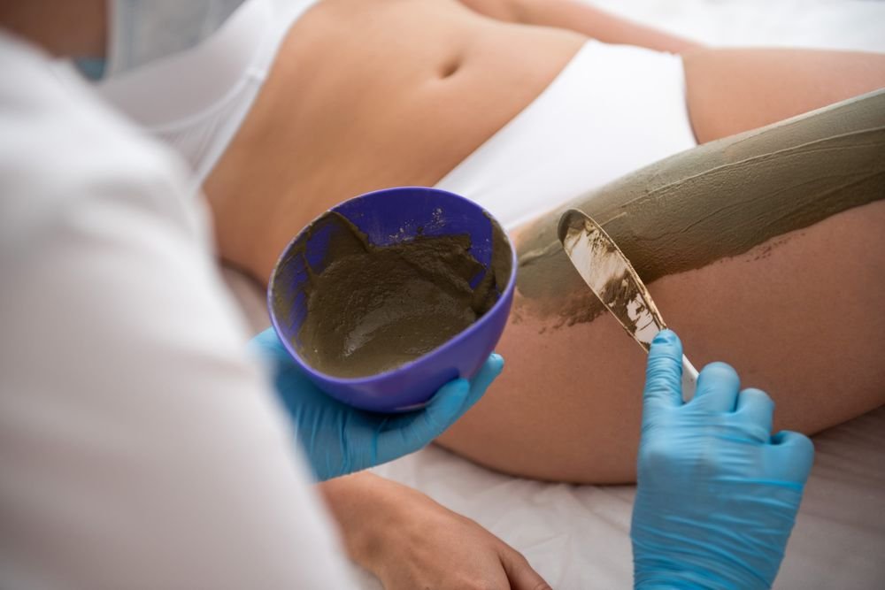 Professional Deep Sea Mud Wrap treatment at Five Star Colonic in Staten Island — detoxifying body wrap service